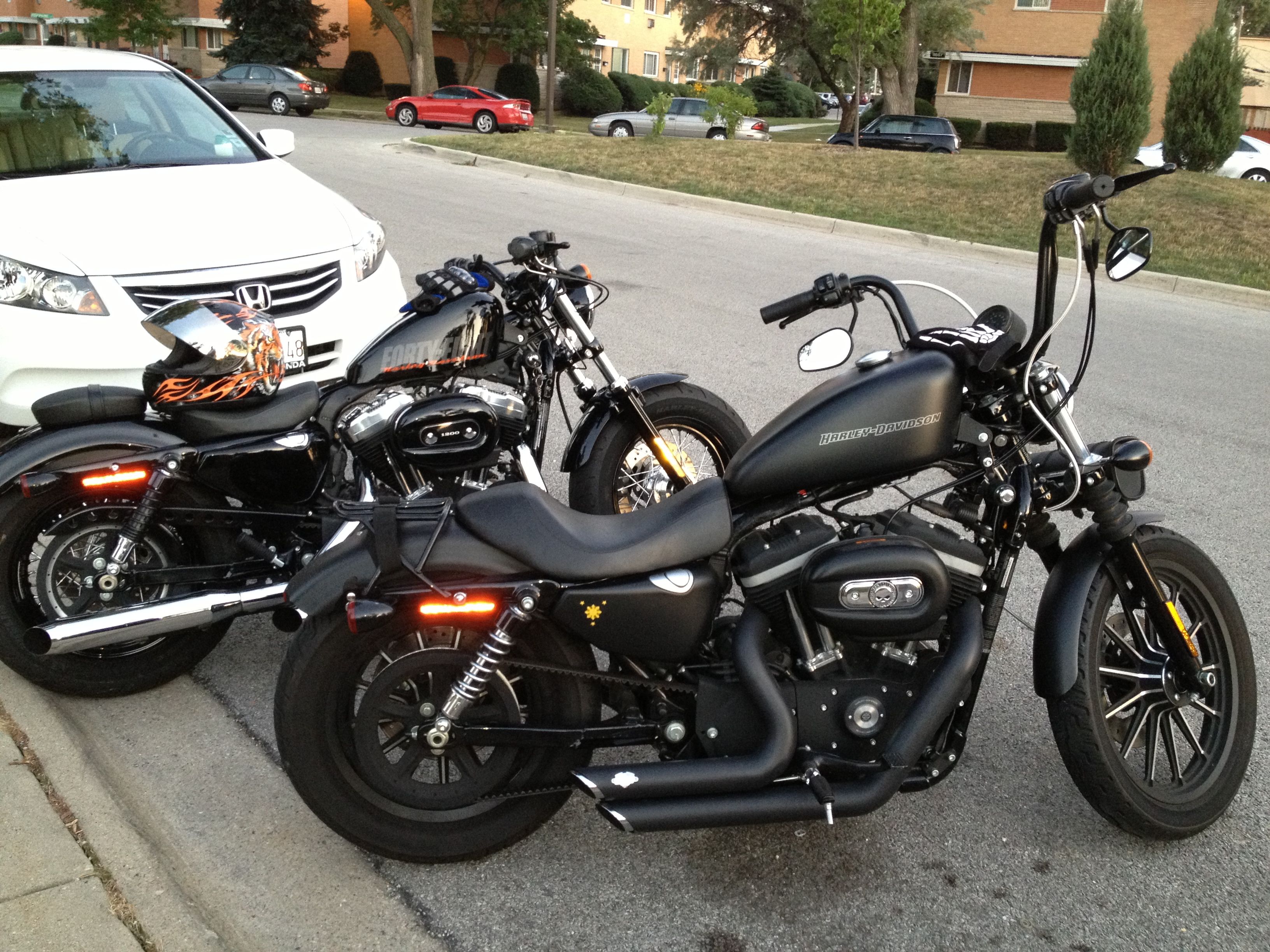Harley-davidson iron 883 vs harley-davidson superlow - know which is better! - bikewale